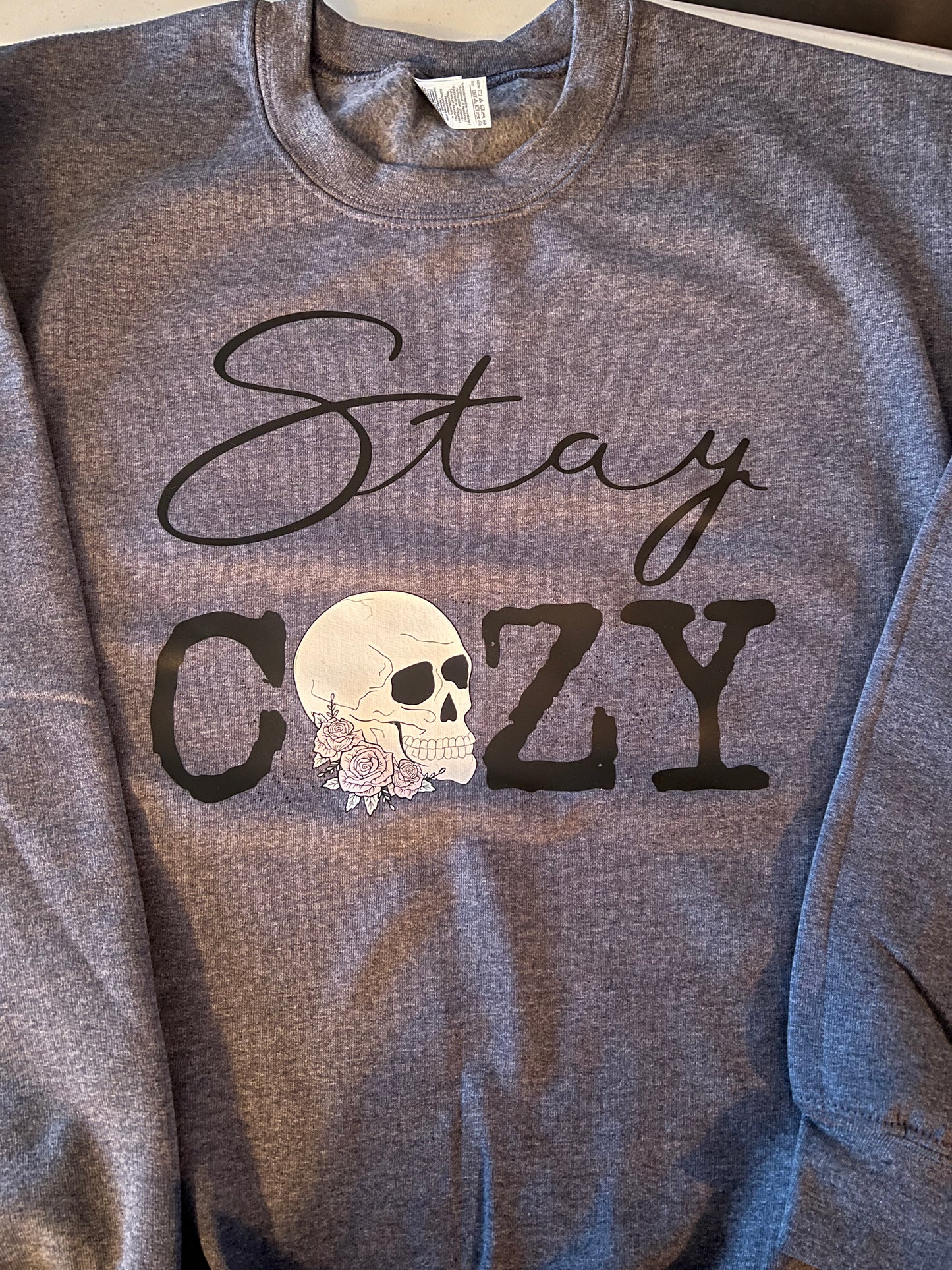 Adult heathered blue Stay Cozy skull crewneck